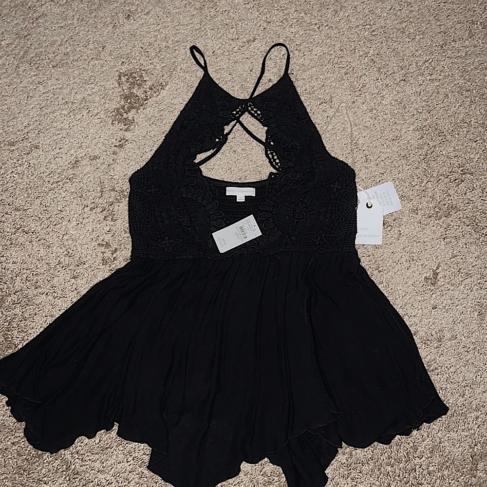Black lace top with low cut detail. From Buckle, new with tags.